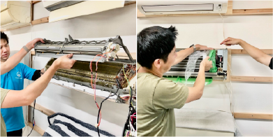 エアコンを分解する2人の男性